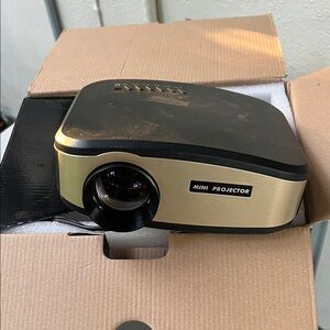 Mini Projector in Black and Gold
